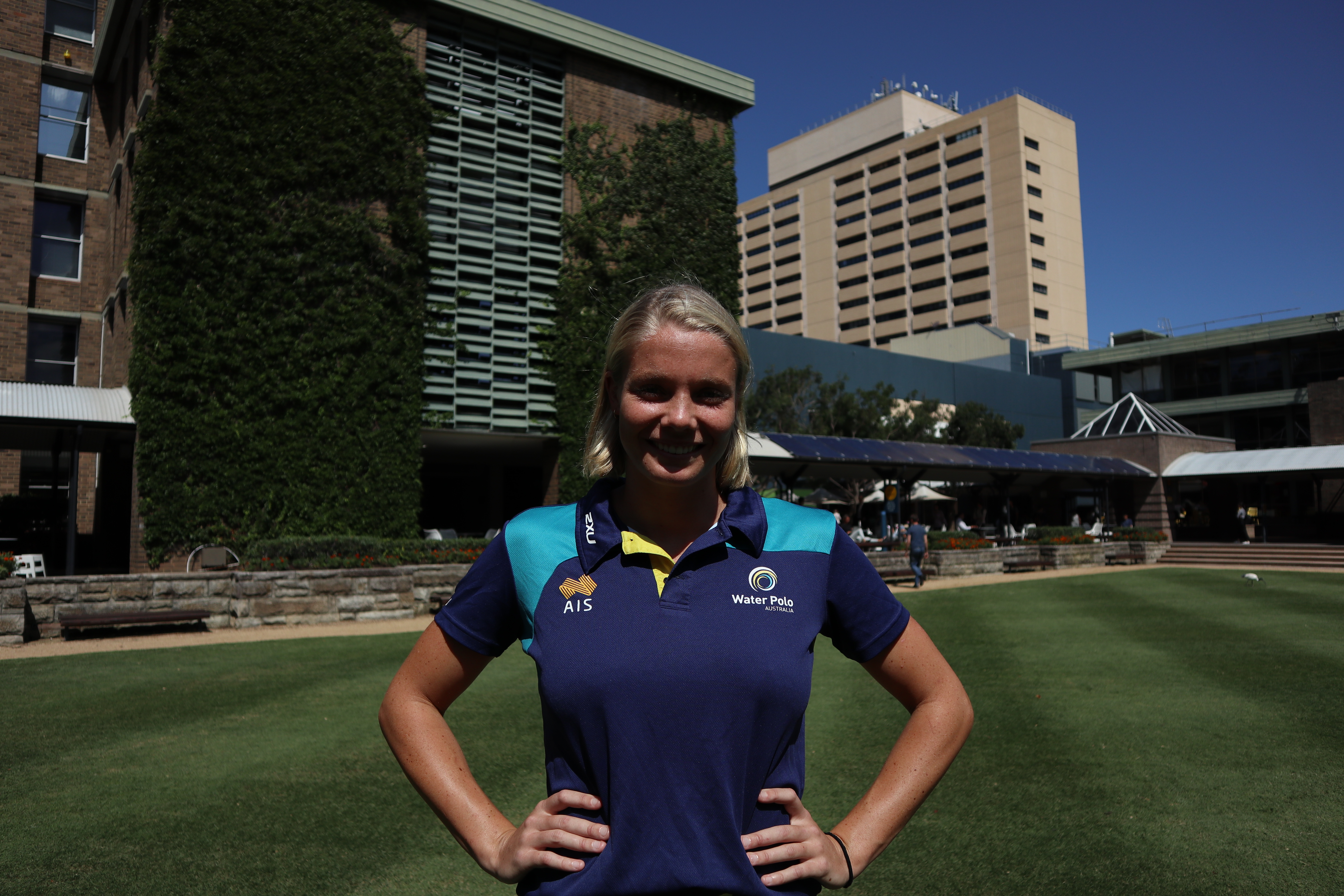 Amy Ridge in Water Polo Australia uniform on the UNSW Library Lawn