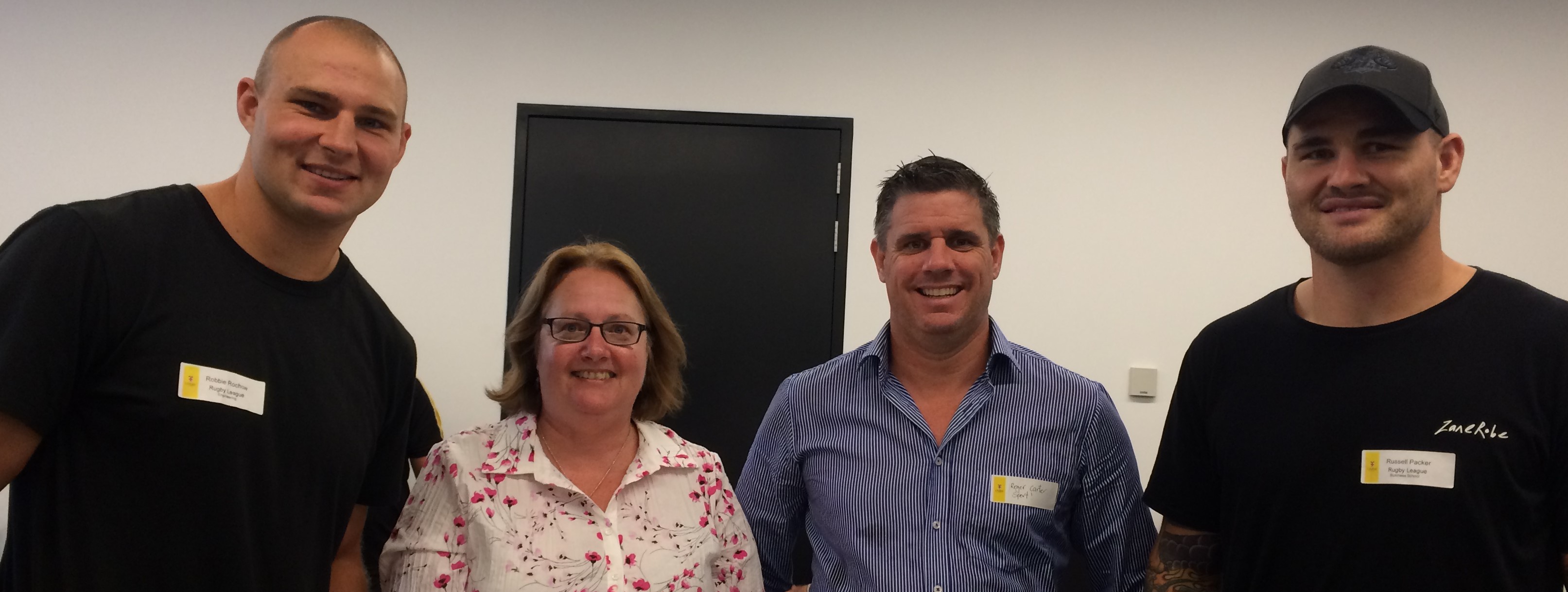 Robbie Rochow (left) and Russell Packer (right) with UNSW's Elite Athlete Program Manager Helen Bryson and Sport Development Manager Roger Carter