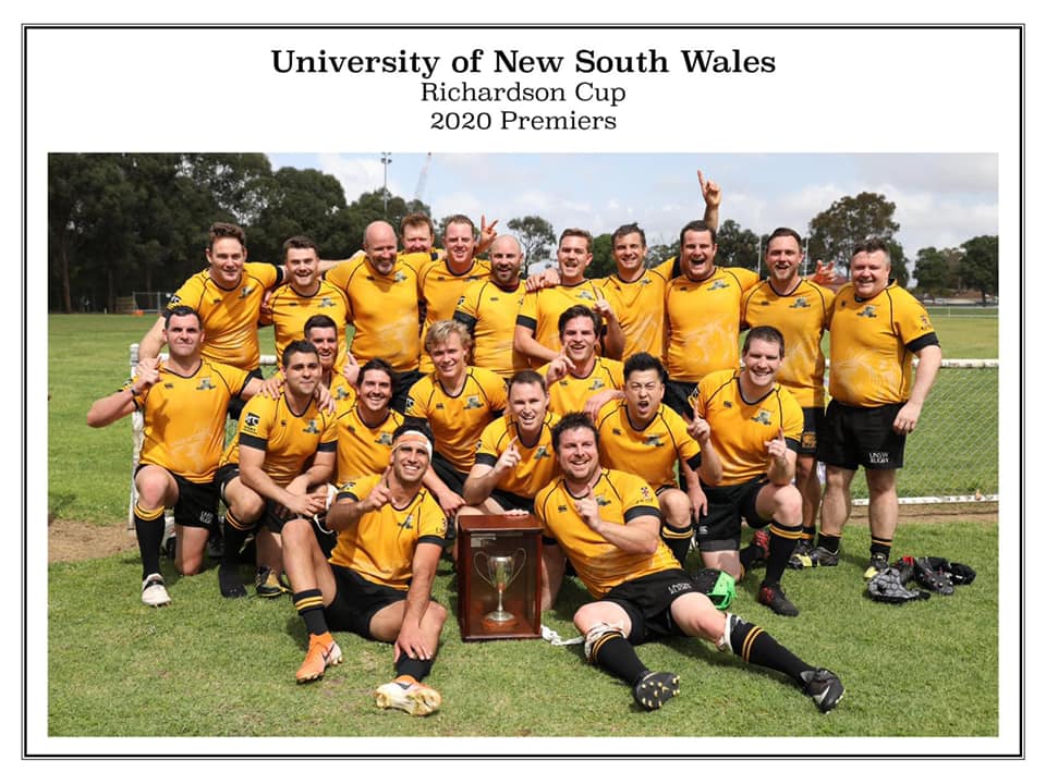 The UNSW Richardson Cup rugby team posing with the trophy