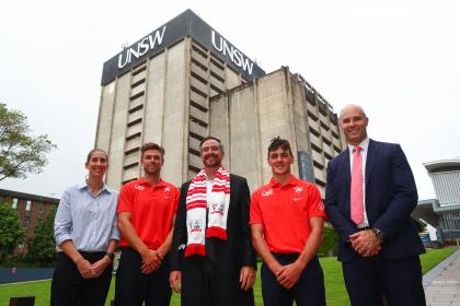 Sydney Swans and UNSW representatives at the UNSW campus