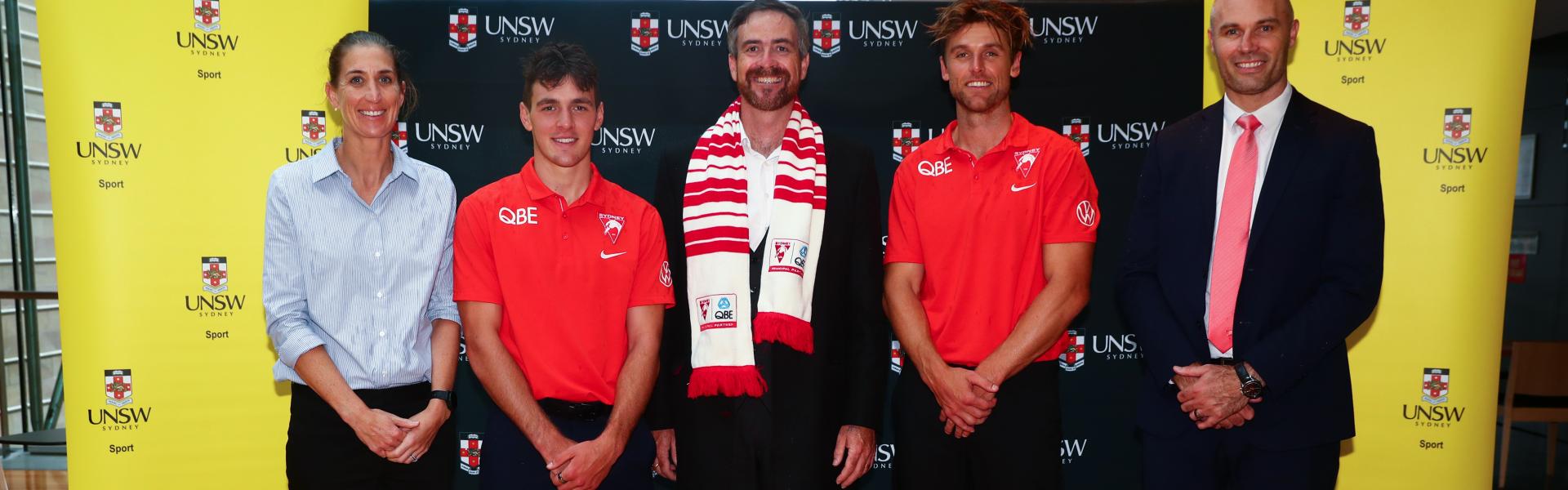 Sydney Swans players and administrators at UNSW to announce the partnership between the two organisations